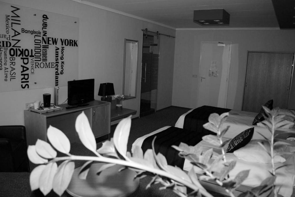 Hotel & Appartementen Royal Sas van Gent الغرفة الصورة